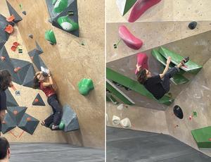 Osoba, uprawia bouldering na krytej ściance wspinaczkowej. Jest ustawiony poziomo, z ciałem równolegle do ziemi, a lewą ręką trzyma duży, różowy uchwyt wspinaczkowy. Prawa ręka jest wyciągnięta w kierunku innego uchwytu, podczas gdy nogi są zgięte w kolanach, z prawą stopą umieszczoną na zielonym uchwycie, a lewą stopą lekko uniesioną. Na ścianie wspinaczkowej znajdują się różne chwyty, w tym kilka dużych zielonych brył i mniejsze czarno-białe chwyty rozrzucone po powierzchni. Sama ściana jest pochylona, co stanowi wyzwanie dla wspinacza.